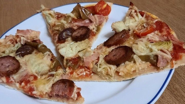 Pizza mit Artischocken und Kümmelwurst - Rezept | Frag Mutti